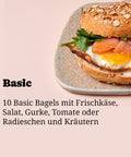 Bagel zum Bestellen und Abholen bei Café Adeli Köln: Frischer Vollkorn-Bagel mit Lachs, Avocado und Frischkäse aus der Gemischten Box