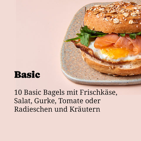 Bagel zum Bestellen und Abholen bei Café Adeli Köln: Frischer Vollkorn-Bagel mit Lachs, Avocado und Frischkäse aus der Gemischten Box